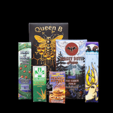 A group of boxes of various sizes and embellishments produced by Tree Street Packaging.
