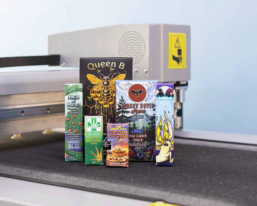 Various packages on a counter with a machine in the background