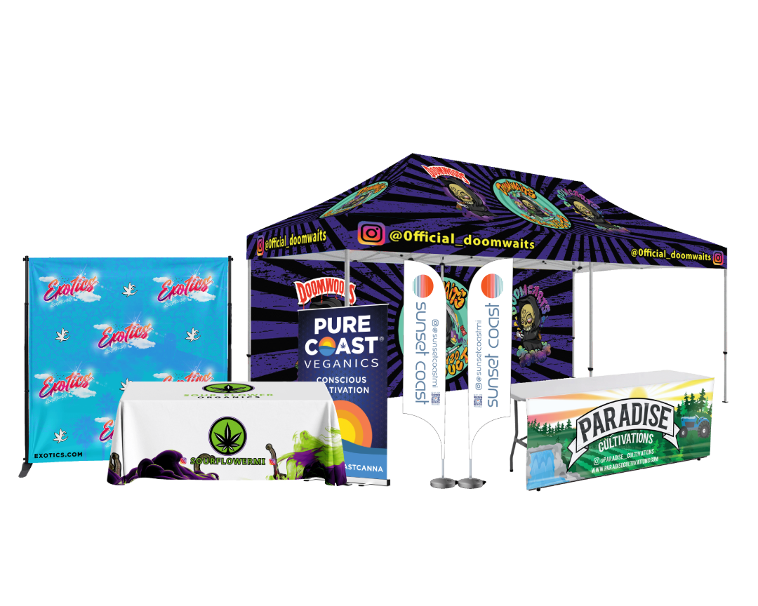 Outdoor event setup with branded tents and banners and flags.